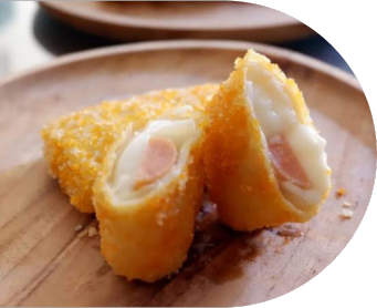 Young diverse couple having lunch with junk food